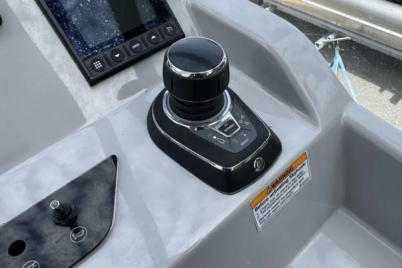  Yacht Photos Pics Control panel of 2024 Beneteau Flyer 10 boat with joystick and display.