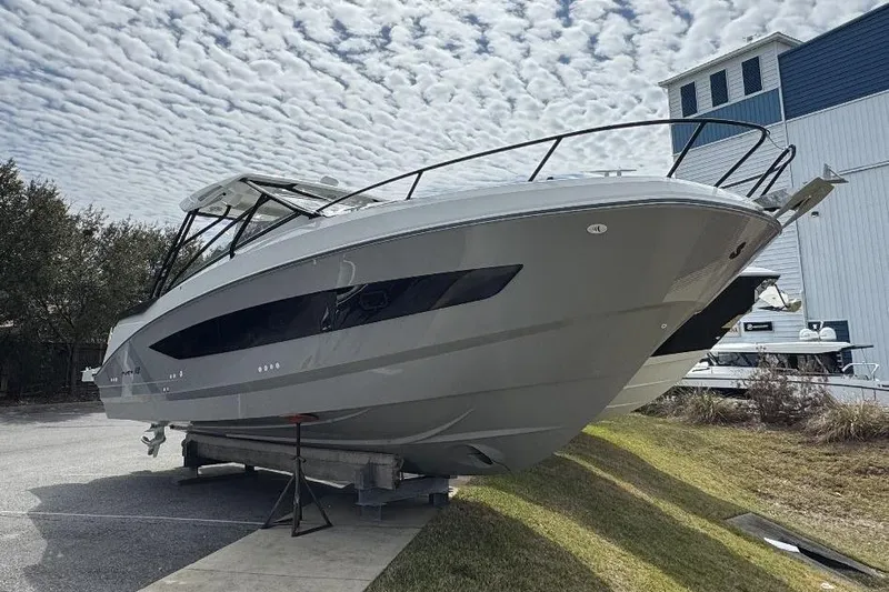  Yacht Photos Pics 2024 Beneteau Flyer 10 boat displayed outdoors under a cloudy sky.