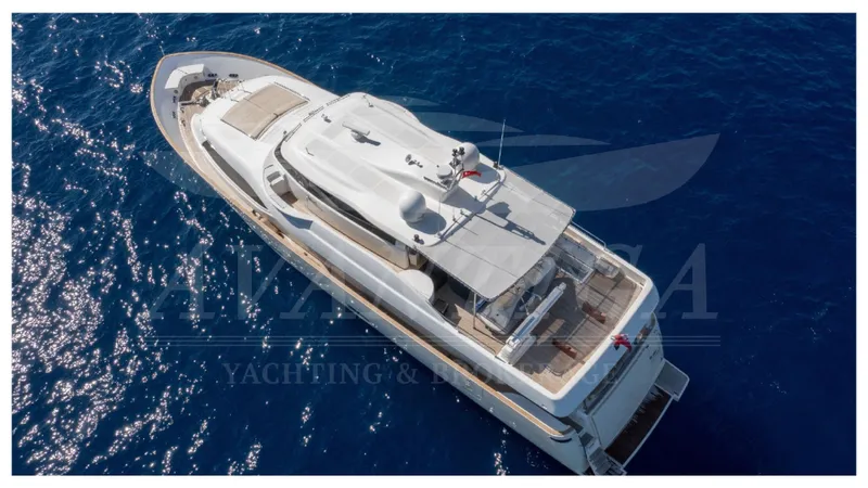  Yacht Photos Pics Aerial view of 2008 Ferretti Yachts Customline Navetta 26 on blue ocean water.