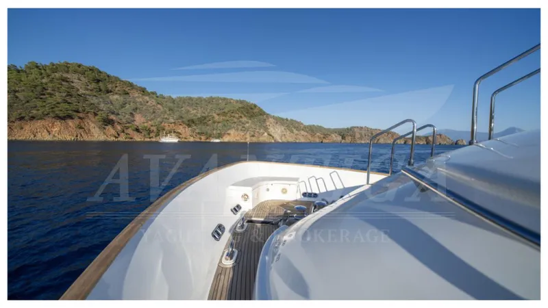  Yacht Photos Pics Ferretti Yachts Customline Navetta 26, 2008, cruising near scenic coastline under clear blue sky.