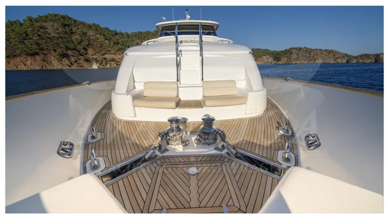  Yacht Photos Pics 2008 Ferretti Yachts Customline Navetta 26, elegant deck view with seating, ocean backdrop.