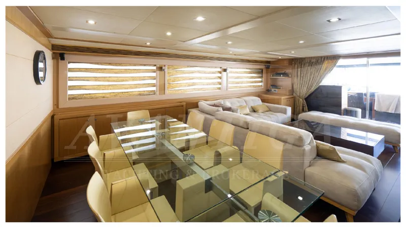  Yacht Photos Pics Luxurious interior of 2008 Ferretti Yachts Customline Navetta 26 with elegant seating and dining area.