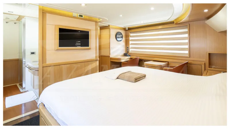  Yacht Photos Pics Luxurious bedroom interior of 2008 Ferretti Yachts Customline Navetta 26 with modern amenities.
