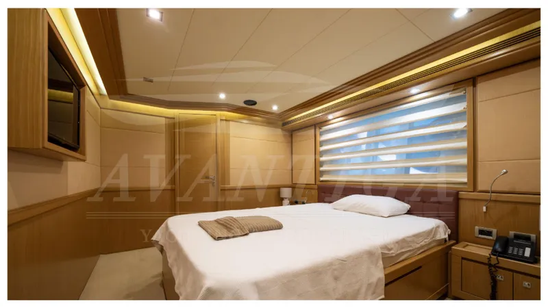  Yacht Photos Pics Luxurious bedroom interior of 2008 Ferretti Yachts Customline Navetta 26 with modern design.