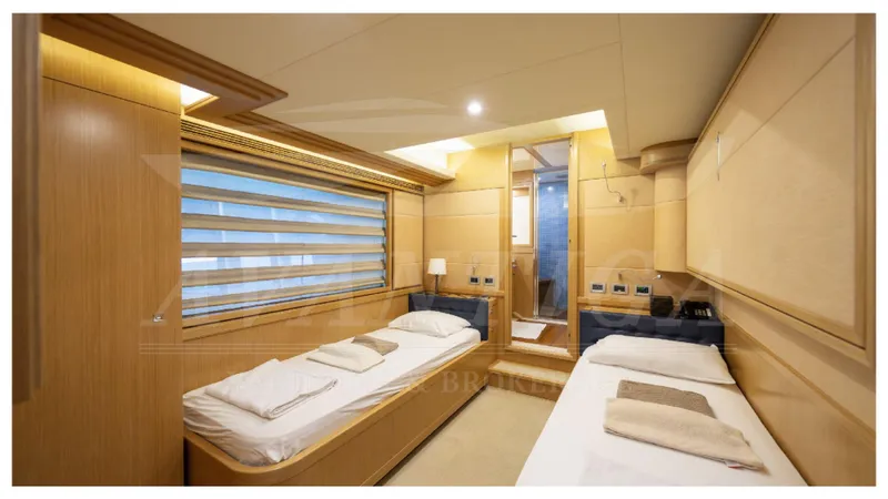  Yacht Photos Pics Luxurious twin cabin interior of 2008 Ferretti Yachts Customline Navetta 26.