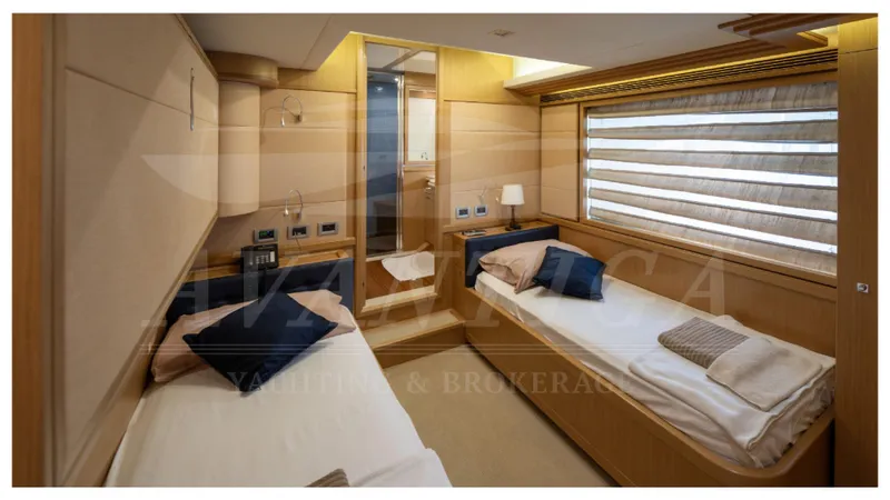  Yacht Photos Pics Luxurious twin cabin interior of 2008 Ferretti Yachts Customline Navetta 26.