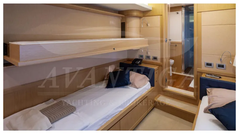  Yacht Photos Pics Luxurious cabin interior of 2008 Ferretti Yachts Customline Navetta 26 with modern amenities.