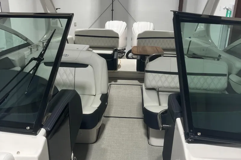  Yacht Photos Pics 2024 Regal 29 OBX boat interior with luxurious seating and modern design.