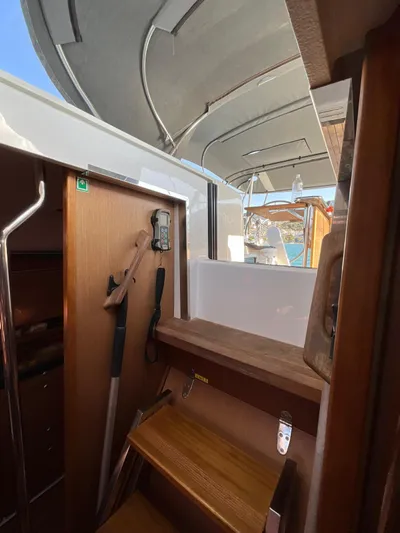Starla Yacht Photos Pics Interior view of 2012 Hanse 445 sailing yacht, fully equipped with wooden steps and nautical equipment.