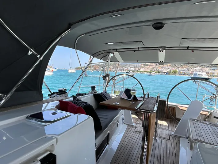 Starla Yacht Photos Pics Interior view of 2012 Hanse 445 yacht with ocean backdrop.