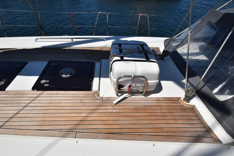 Starla Yacht Photos Pics Deck of 2012 Hanse 445 yacht with wooden flooring and safety equipment.