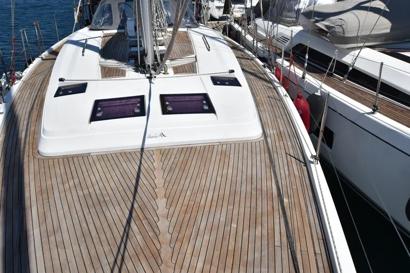 Starla Yacht Photos Pics Deck of 2012 Hanse 445 sailboat with wooden finish and sleek design.