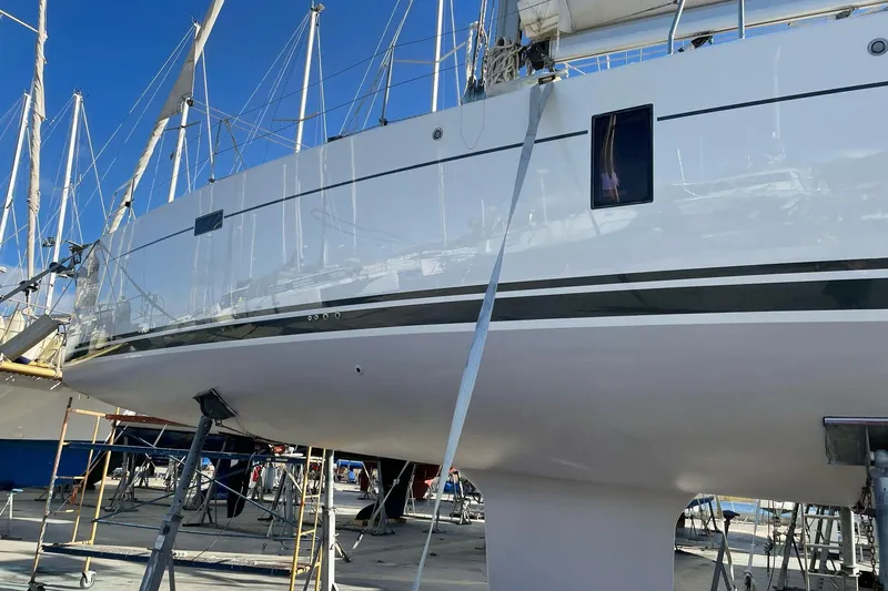 Starla Yacht Photos Pics 2012 Hanse 445 yacht on dry dock, showcasing sleek hull design and rigging.