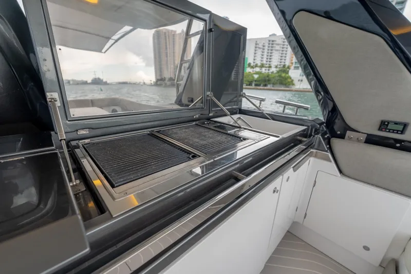 Azul Yacht Photos Pics Outdoor kitchen on 2021 Azimut Verve 47 yacht with grill and scenic water view.
