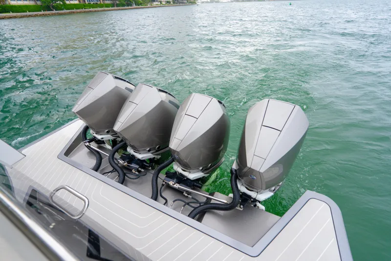 Azul Yacht Photos Pics Four powerful outboard engines on a 2021 Azimut Verve 47 yacht in water.
