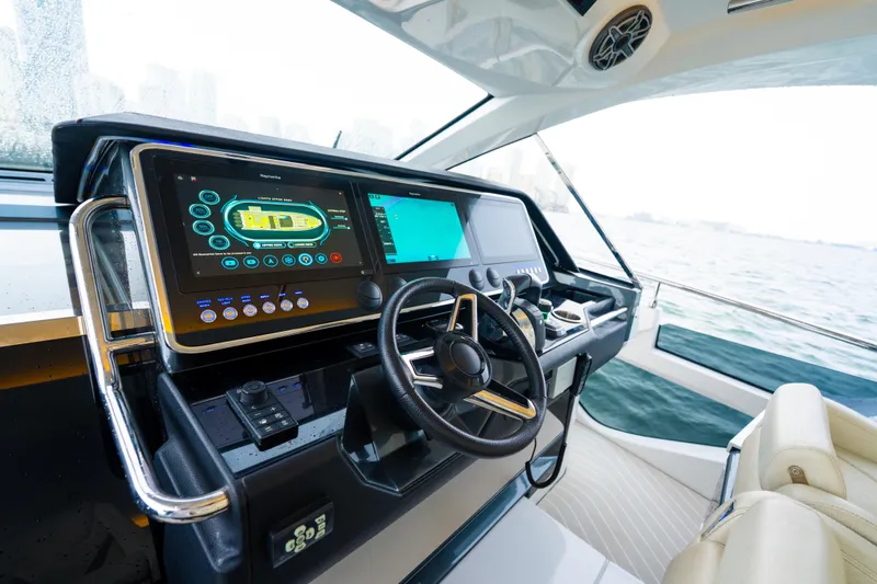 Azul Yacht Photos Pics Helm of 2021 Azimut Verve 47 yacht with advanced navigation displays.