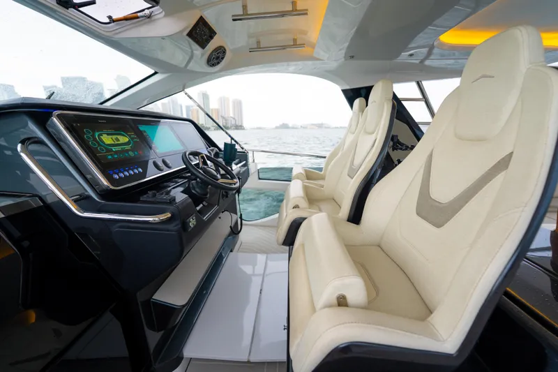 Azul Yacht Photos Pics Interior of 2021 Azimut Verve 47 yacht with modern dashboard and luxurious seating.