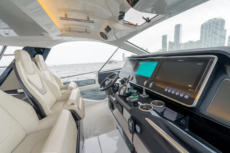 Azul Yacht Photos Pics Interior of 2021 Azimut Verve 47 yacht with modern dashboard and luxurious seating.