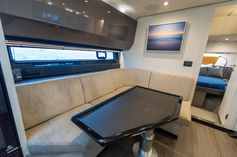 Azul Yacht Photos Pics Interior of 2021 Azimut Verve 47 yacht with modern seating and artwork.