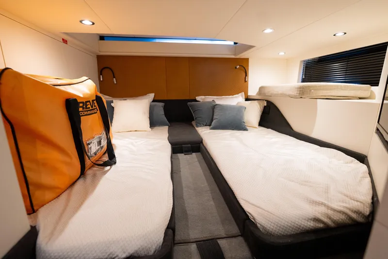 Azul Yacht Photos Pics Luxurious cabin interior of 2021 Azimut Verve 47 yacht with twin beds and modern decor.