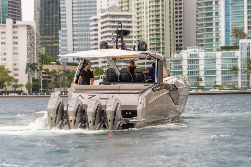 Azul Yacht Photos Pics 2021 Azimut Verve 47 yacht cruising in urban waterfront setting.