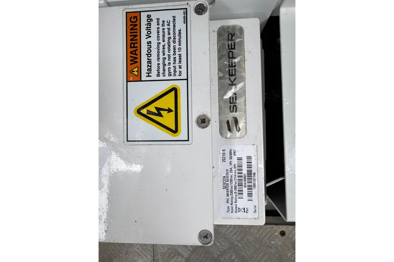 Azul Yacht Photos Pics Warning label on Seakeeper device in 2021 Azimut Verve 47 boat.