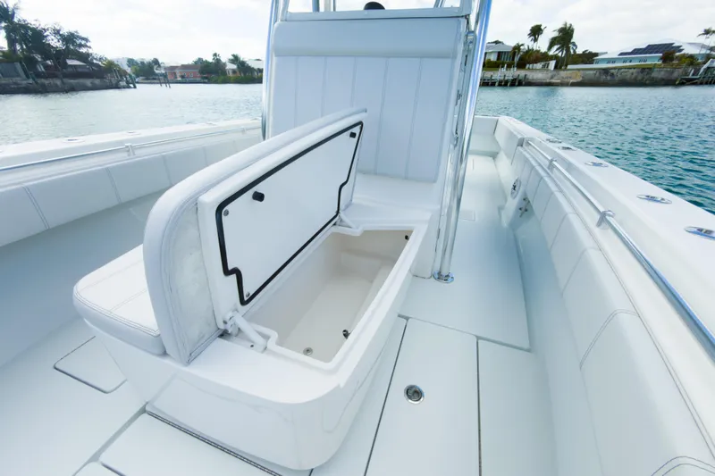 No Name Yacht Photos Pics 2023 Contender 32 ST boat with open storage compartment on deck.