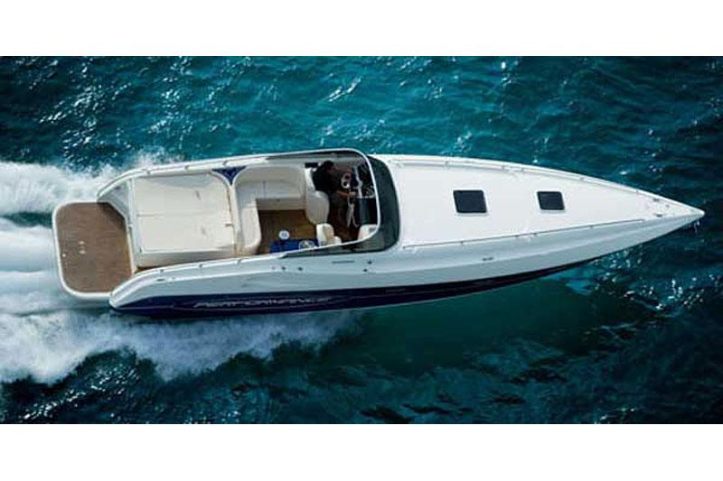 2007 Performance 1107 speedboat cruising on clear blue water.