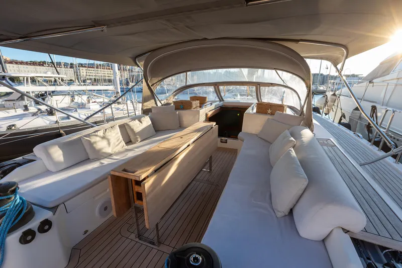  Yacht Photos Pics Luxurious 2014 Italia Yachts 15.98 sailboat interior with elegant seating and wooden accents.