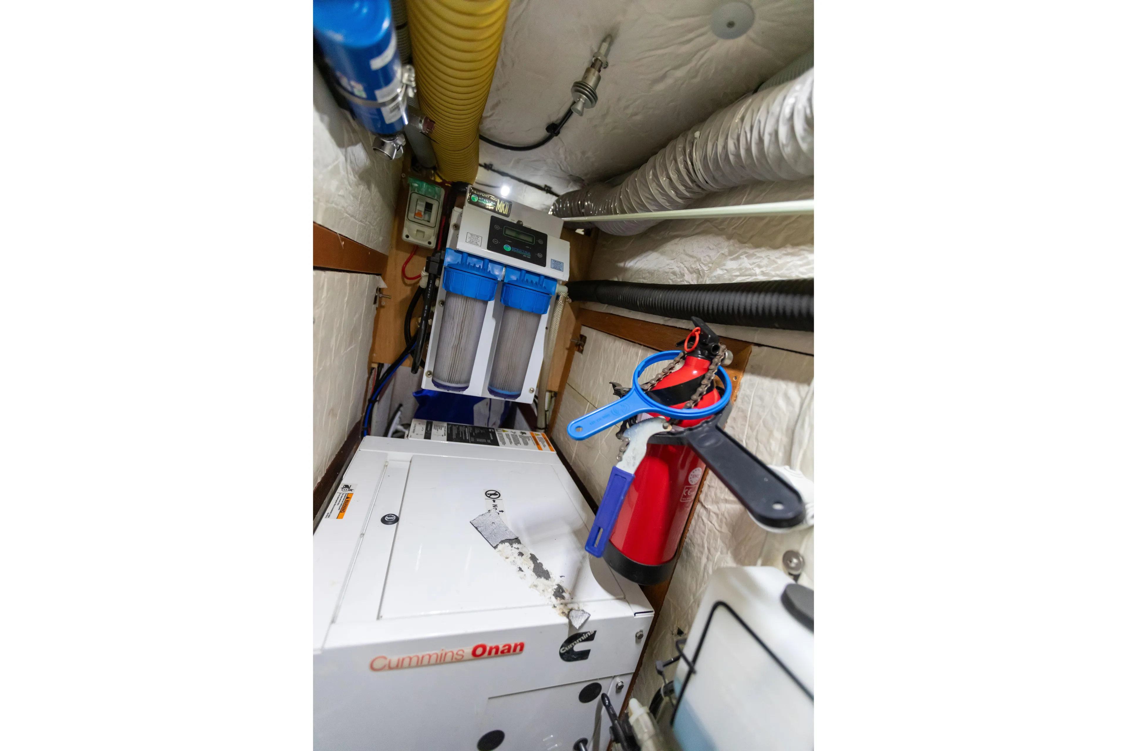  Yacht Photos Pics Engine room of 2014 Italia Yachts 15.98 with Cummins Onan generator and safety equipment.