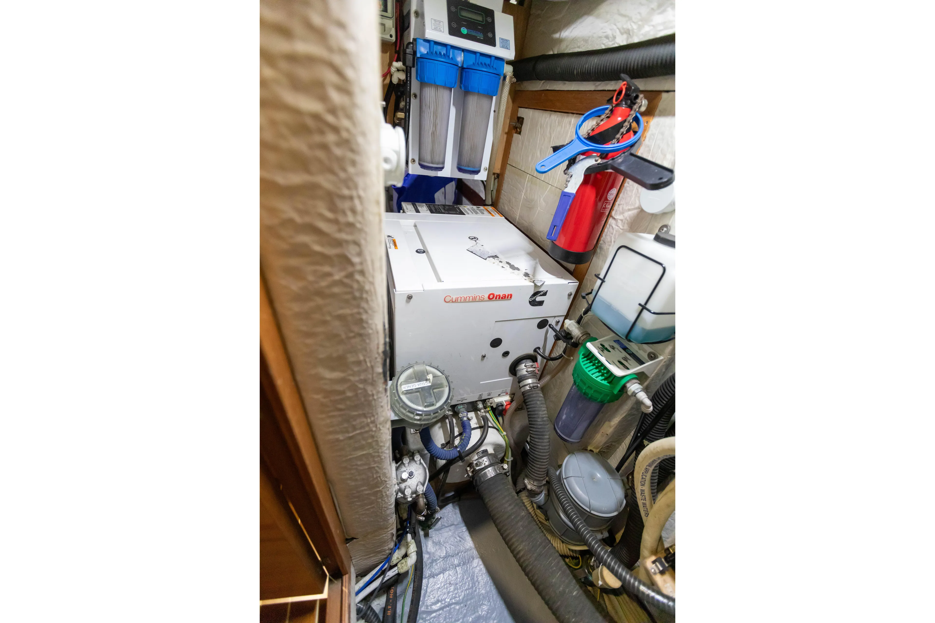  Yacht Photos Pics Engine room of 2014 Italia Yachts 15.98 with Cummins Onan generator and equipment.