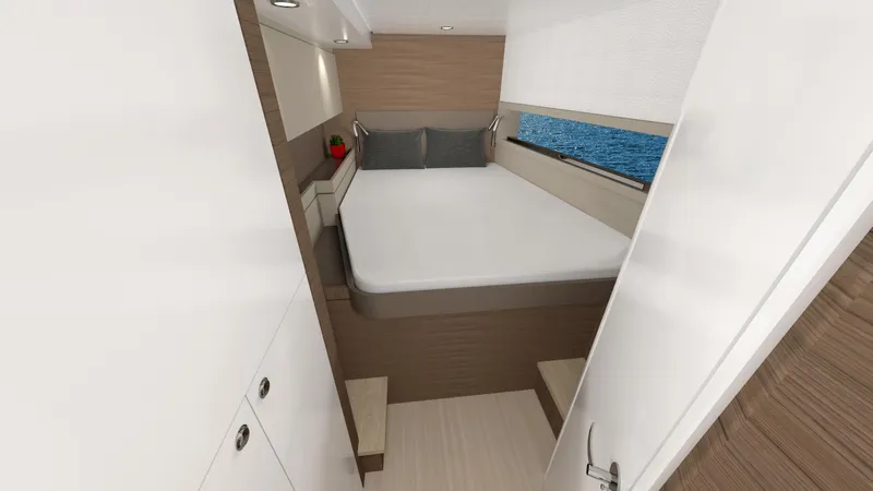  Yacht Photos Pics Modern cabin interior of Bali 4.4 yacht, 2025 model, featuring a cozy bed and ocean view.