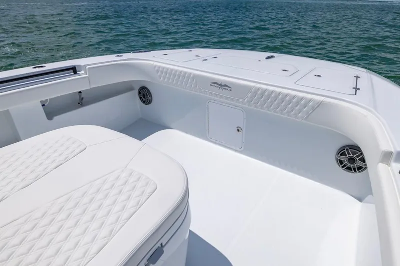  Yacht Photos Pics 2026 Invincible 36 Catamaran interior with white seating and ocean backdrop.