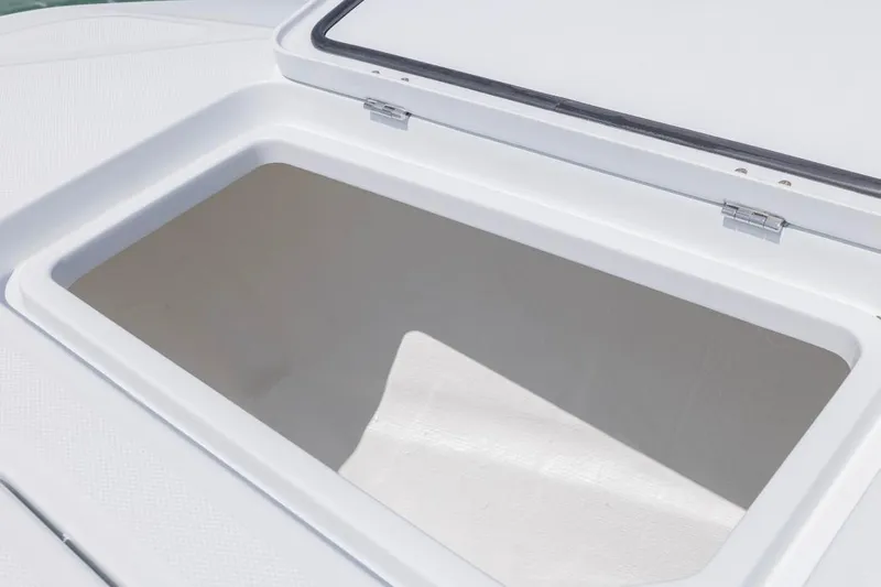  Yacht Photos Pics Open storage compartment on 2026 Invincible 36 Catamaran boat deck.