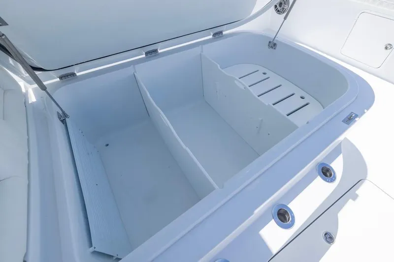  Yacht Photos Pics Open storage compartment on 2026 Invincible 36 Catamaran, showcasing spacious interior design.