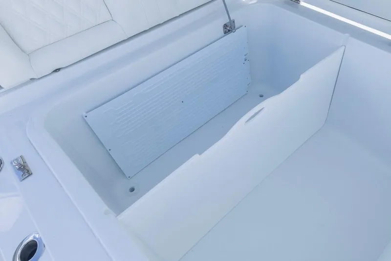  Yacht Photos Pics Storage compartment of 2026 Invincible 36 Catamaran, featuring a sleek white interior design.
