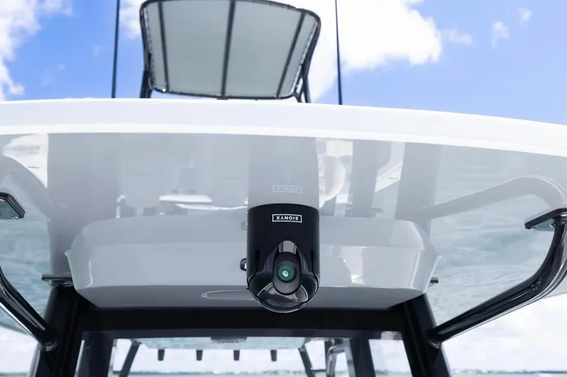  Yacht Photos Pics 2026 Invincible 36 Catamaran with advanced camera system under clear blue sky.