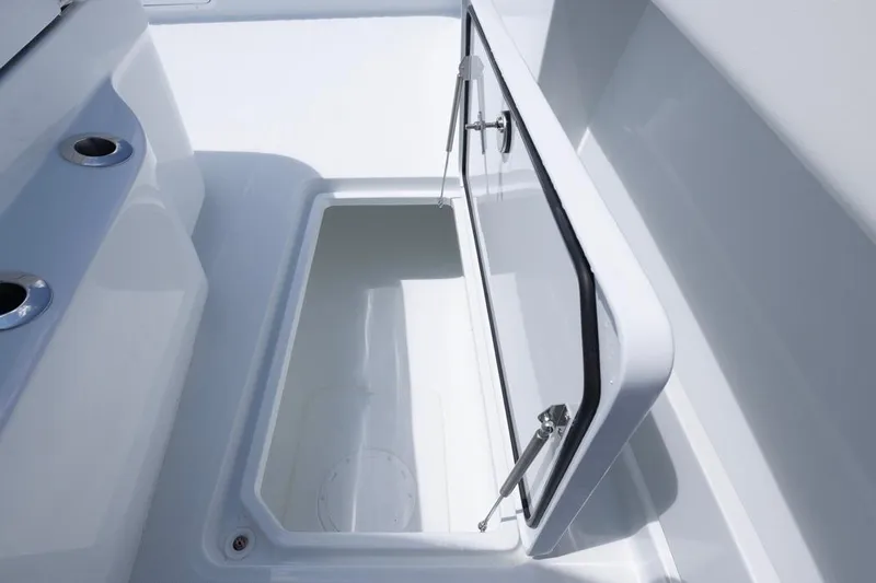  Yacht Photos Pics Open storage compartment on 2026 Invincible 36 Catamaran, showcasing sleek design and functionality.