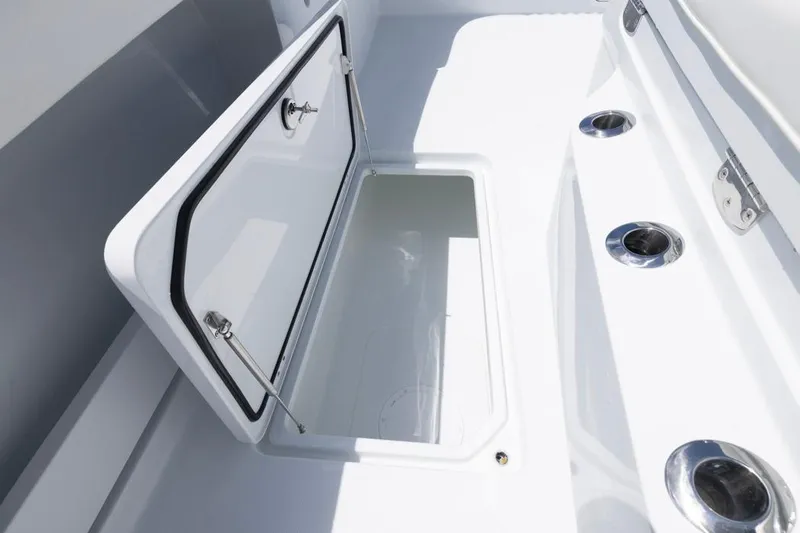  Yacht Photos Pics Open storage compartment on 2026 Invincible 36 Catamaran, featuring sleek design and stainless steel fixtures.