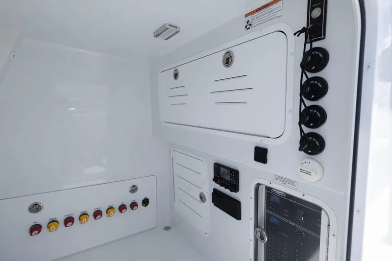  Yacht Photos Pics Interior control panel of 2026 Invincible 36 Catamaran with switches and gauges.