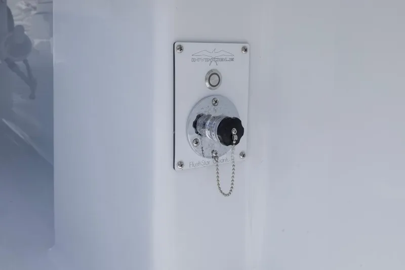  Yacht Photos Pics Flush system on 2026 Invincible 36 Catamaran, featuring a secure cap and chain.
