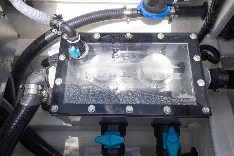  Yacht Photos Pics Engine compartment of 2026 Invincible 36 Catamaran with visible hoses and components.
