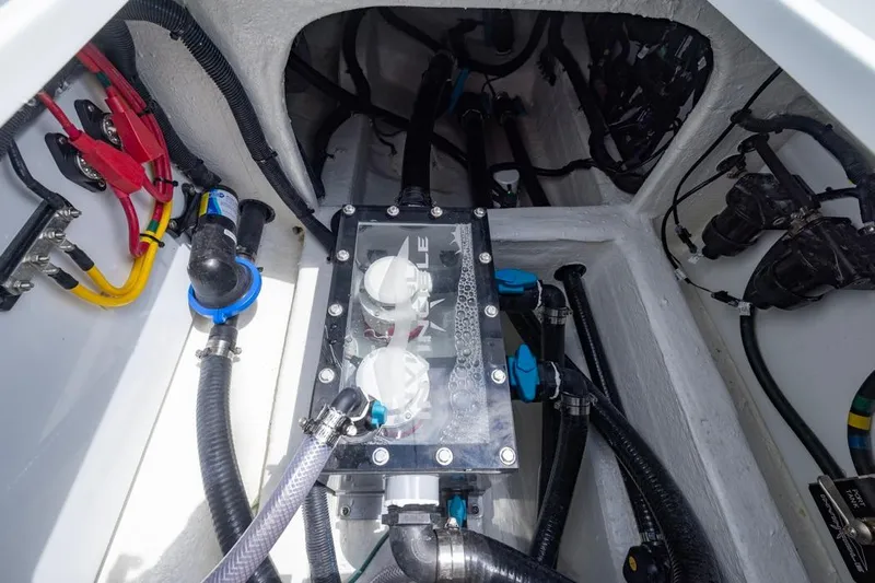  Yacht Photos Pics Engine compartment of 2026 Invincible 36 Catamaran with visible wiring and components.