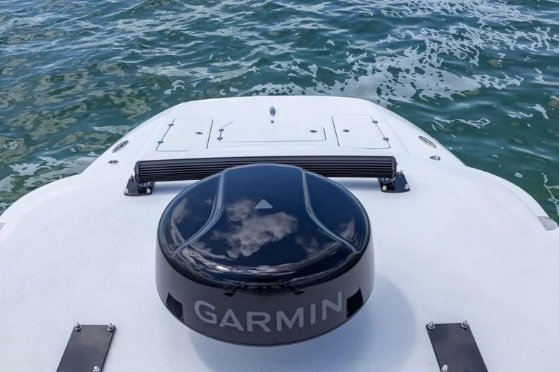  Yacht Photos Pics 2026 Invincible 36 Catamaran with Garmin equipment on deck, near water.