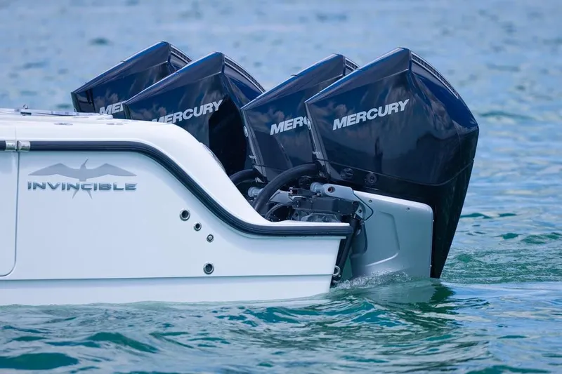  Yacht Photos Pics 2026 Invincible 36 Catamaran with Mercury engines on water.