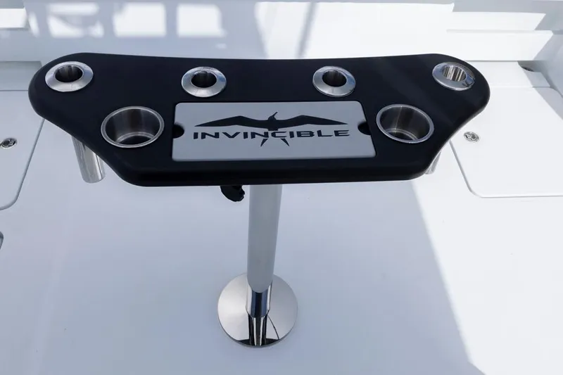  Yacht Photos Pics 2026 Invincible 36 Catamaran rod holder with logo, featuring multiple cup holders.