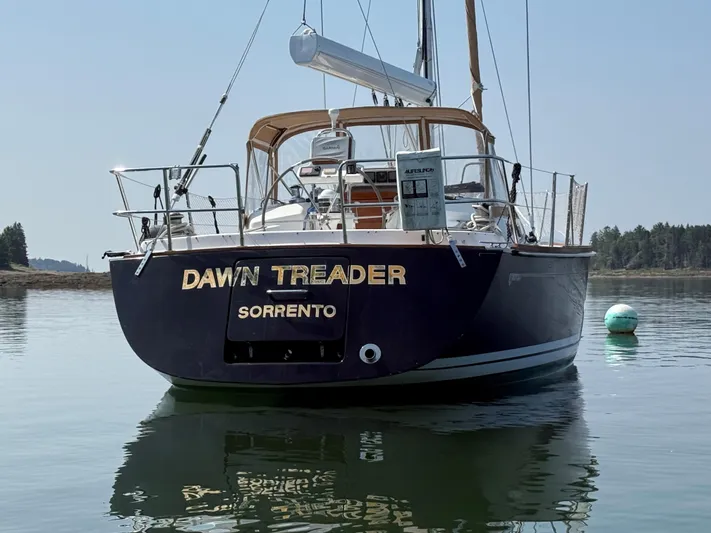 Dawn Treader Yacht Photos Pics Tartan 3700 Keel/Centerboard sailboat "Dawn Treader" on calm water, 2005 model.