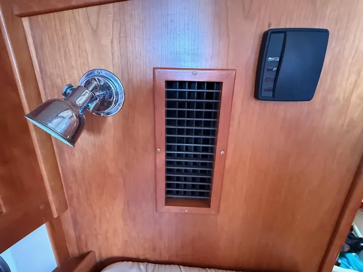 Dawn Treader Yacht Photos Pics Interior of 2005 Tartan 3700 Keel/Centerboard with lamp, vent, and control panel.