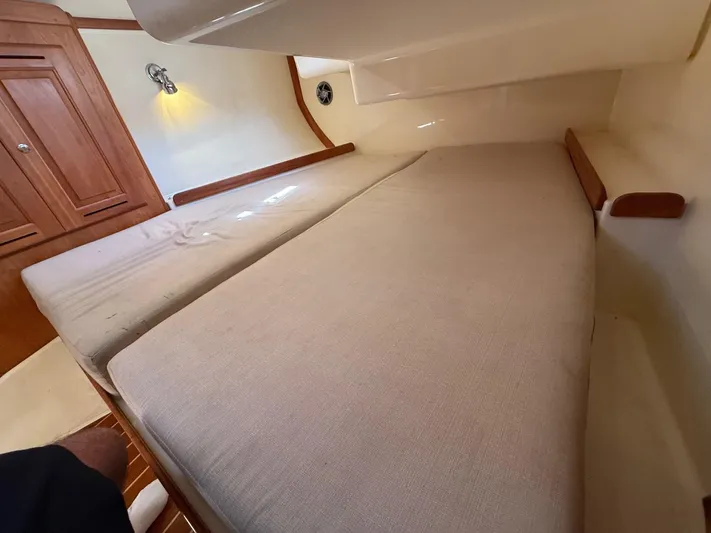 Dawn Treader Yacht Photos Pics Interior cabin of 2005 Tartan 3700 Keel/Centerboard sailboat with wooden accents.