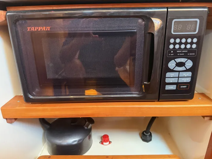 Dawn Treader Yacht Photos Pics Tappan microwave in a Tartan 3700 Keel/Centerboard yacht kitchen, 2005 model.